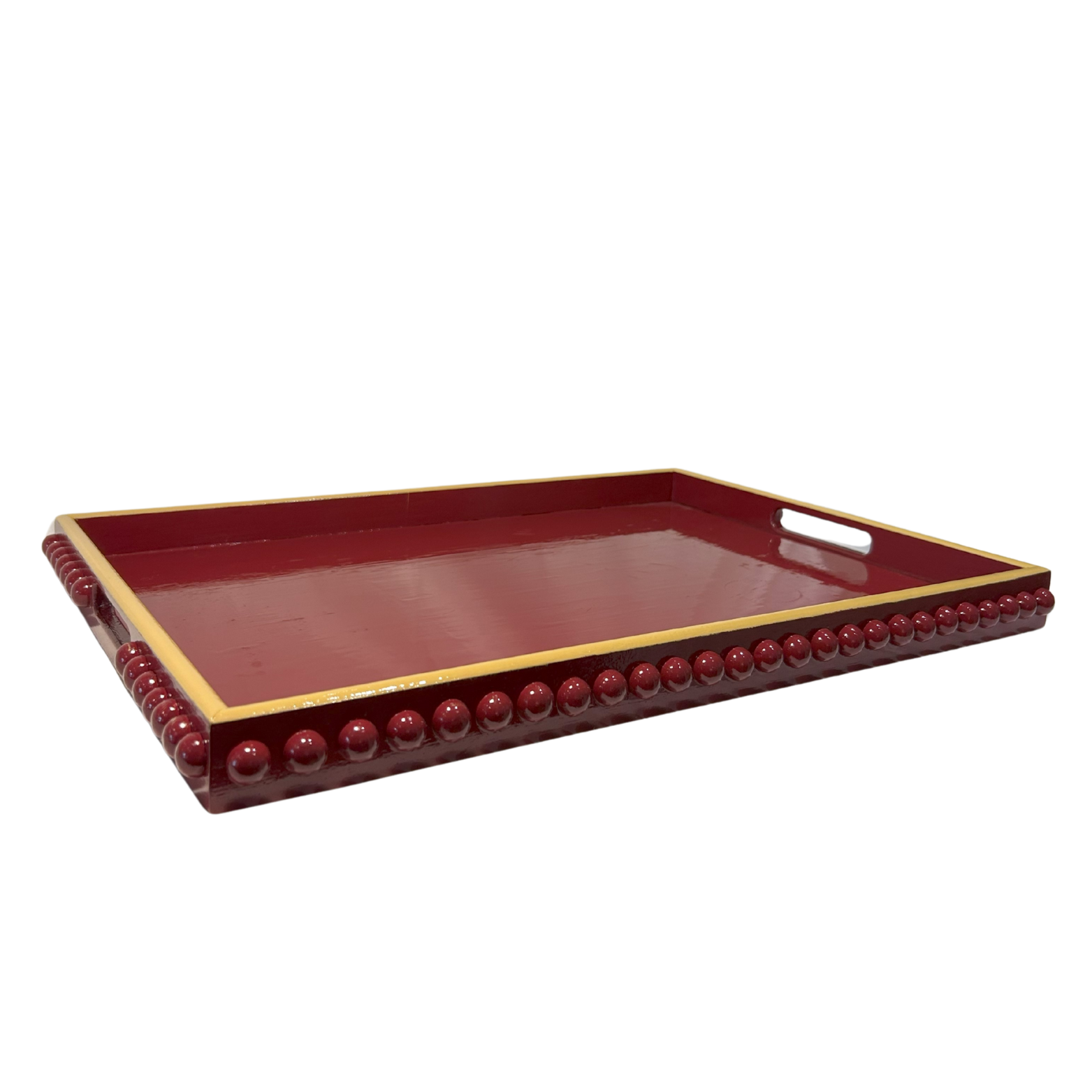 A rectangular, hand painted deep red coffee table tray with mustard yellow edge and handles.